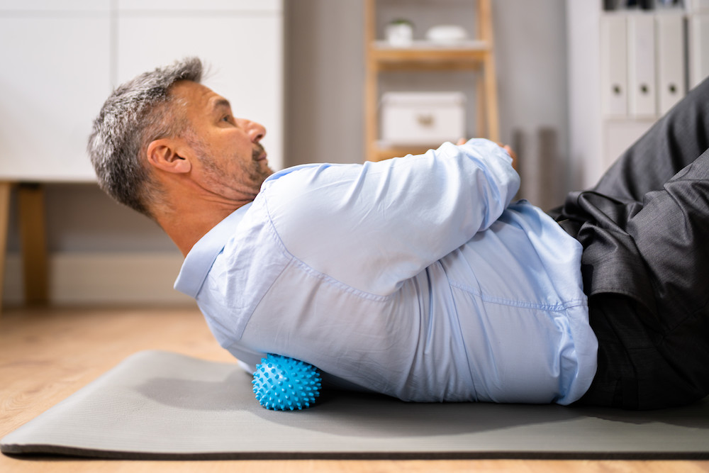 man doing home exercise