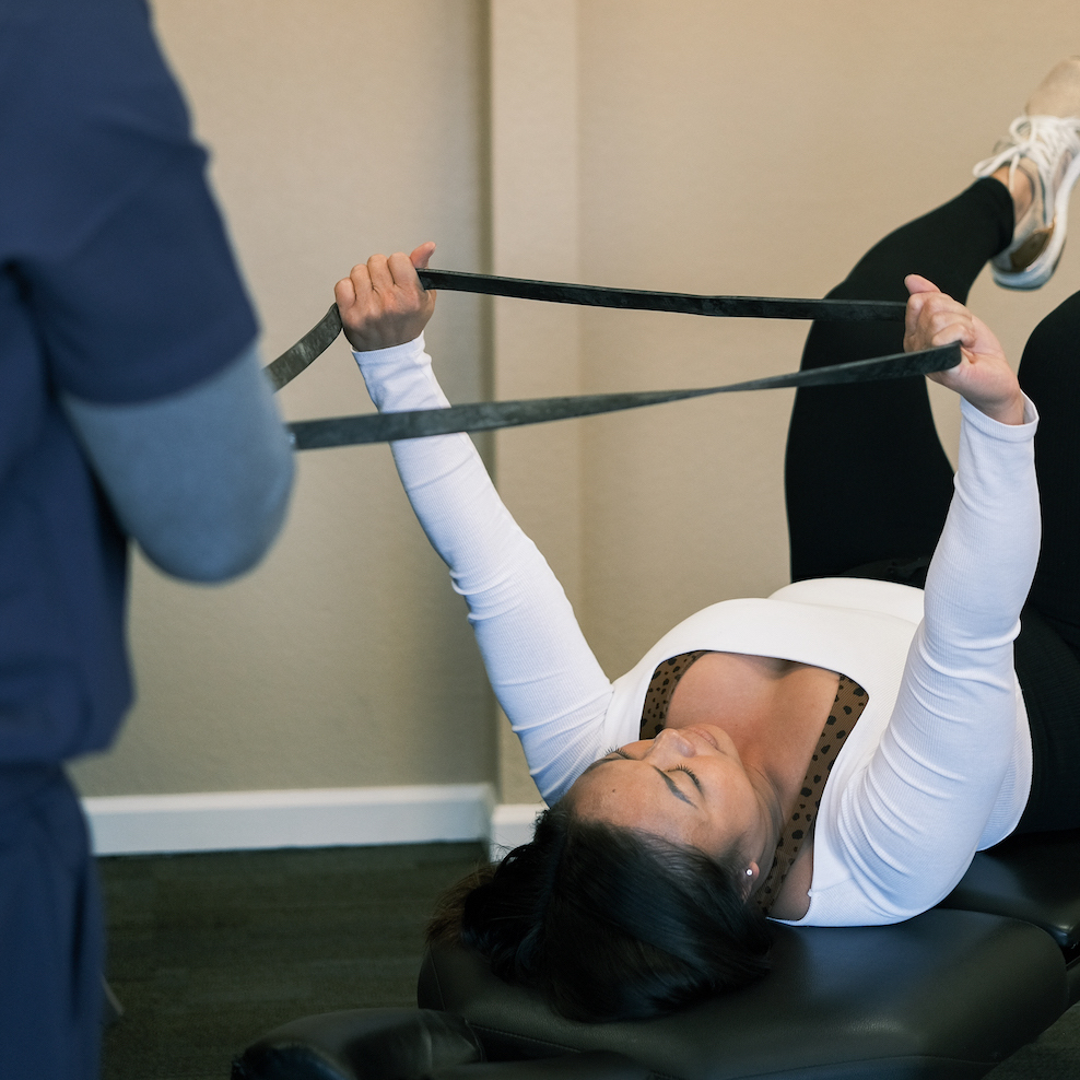 Dr. Jerald Chavez giving patient Physiotherapy